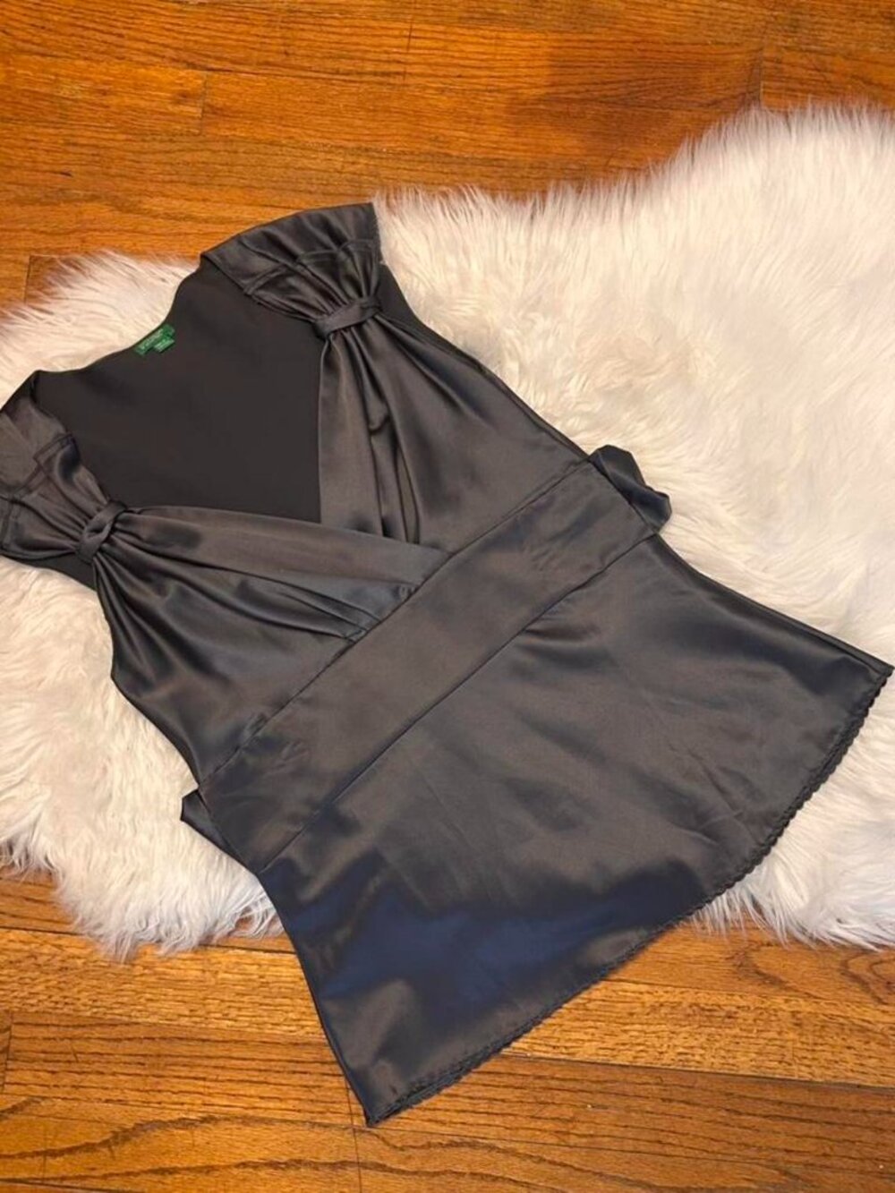Charcoal gray Benetton top. A small color...